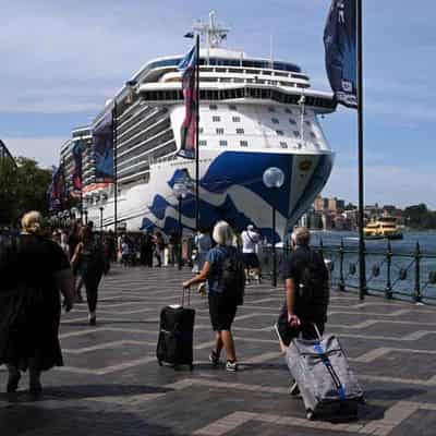 Cruise passengers wave goodbye to COVID restrictions