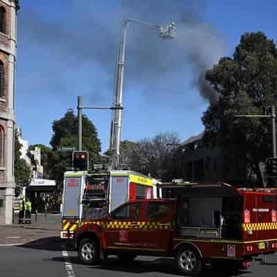 Man's body found after blaze rips through apartment