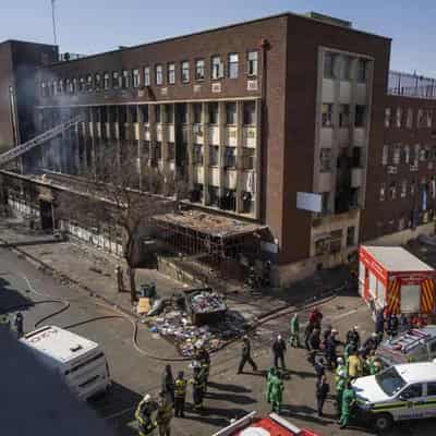 South African apartment block fire kills 74: official