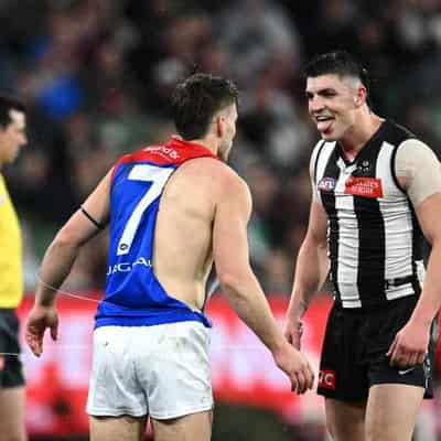 Magpies hold off Demons to win dramatic finals opener