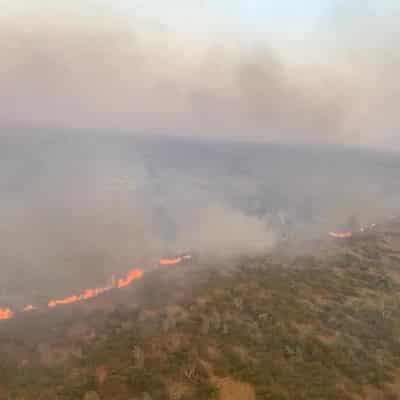 NT mega fire under control, but crews remain on alert