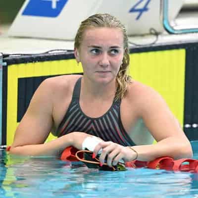 Swim star Titmus has surgery to remove benign tumours