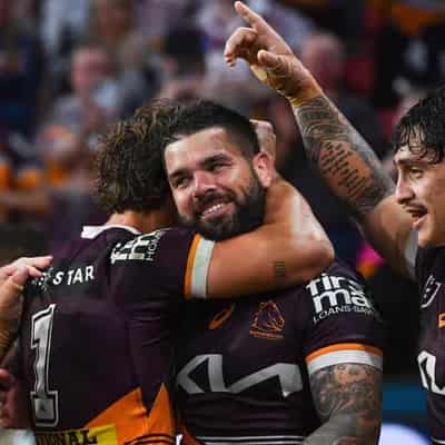 Guru, linchpin and ratbag: Reynolds loving Broncos role