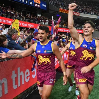 Lions survive Blues blitz to book AFL grand final berth