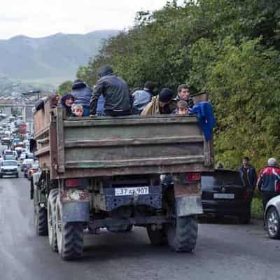 Thousands of ethnic Armenians rush to flee Karabakh