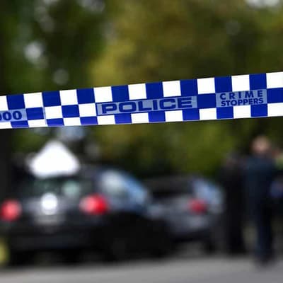 Boy critical, driver charged after laneway collision