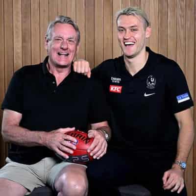 Dad to present cup to son if Magpies win grand final