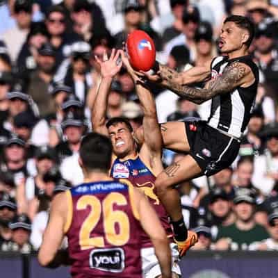 Electric forward Hill wins Norm Smith in Magpies' flag