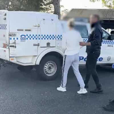 Police raids uncover alleged money laundering scheme