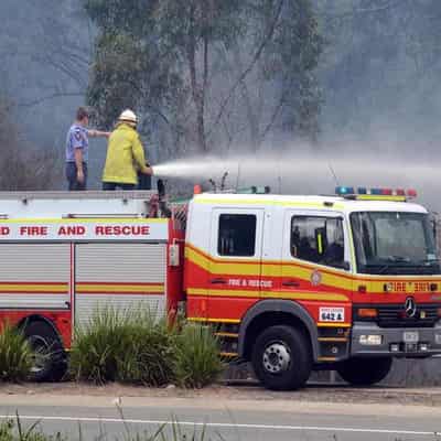 Residents returning to homes after Qld bushfires threat