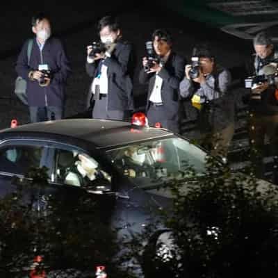 Japan police detain man after post office hostage drama