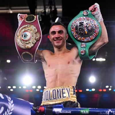 Moloney sets title defence, aims for April unification