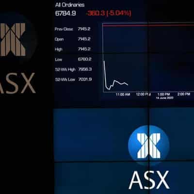 Aust shares rally after Fed chair hints rate hikes over