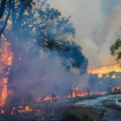 Alert for bushfires southeast of Perth downgraded