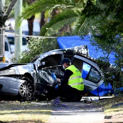 Two boys dead in crash 'carnage' as police hunt driver