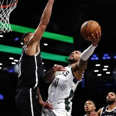 Simmons' shy shooting continues as Bucks run down Nets