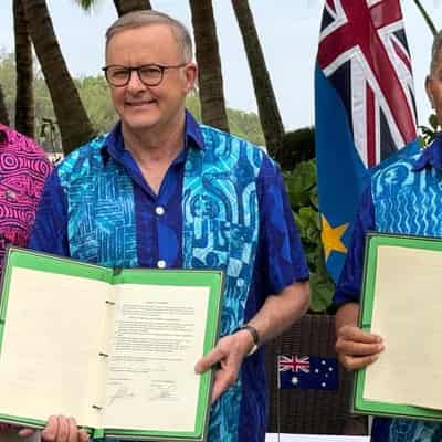 Australia signs surprise pact with climate-hit Tuvalu