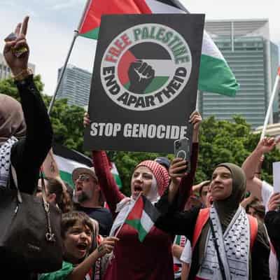 Rallies support Palestine, vigil honours Israel victims