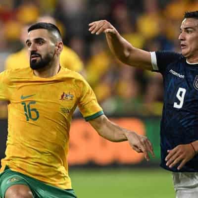 Socceroos' Behich targets top spot in WC qualifying