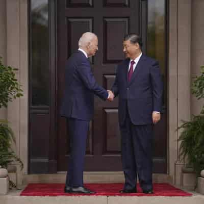 Biden says real progress, deals in talks with Xi