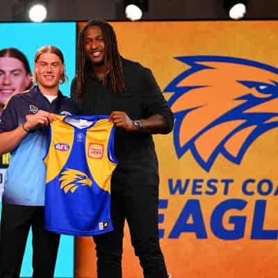 AFL's top draft pick Reid eyes arm-wrestle with Dusty