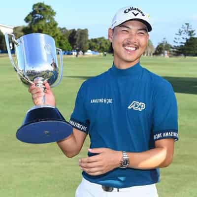 Lee back to work chasing unprecedented golf double