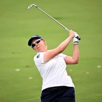 Defending champion Buhai grabs Australian Open lead