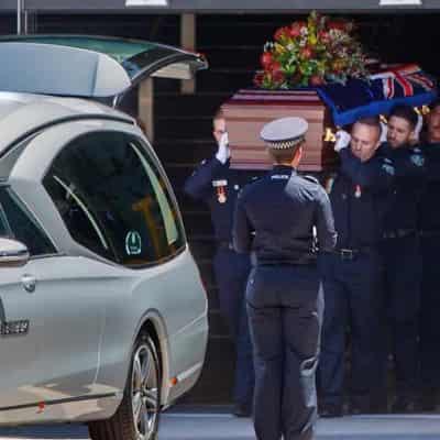 Mourners farewell slain 'legendary' country cop